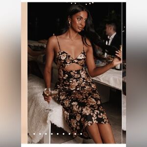 Saga floral cutout dress in black. Worn once!